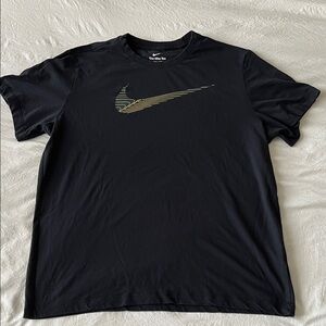 Nike Men's Black Tee with Gold Swoosh